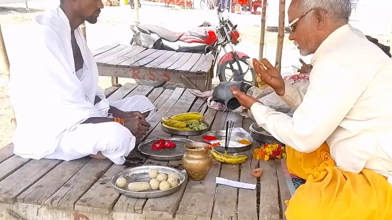 image of a person and pandit ji, pandit ji was said to a man related to the rituals