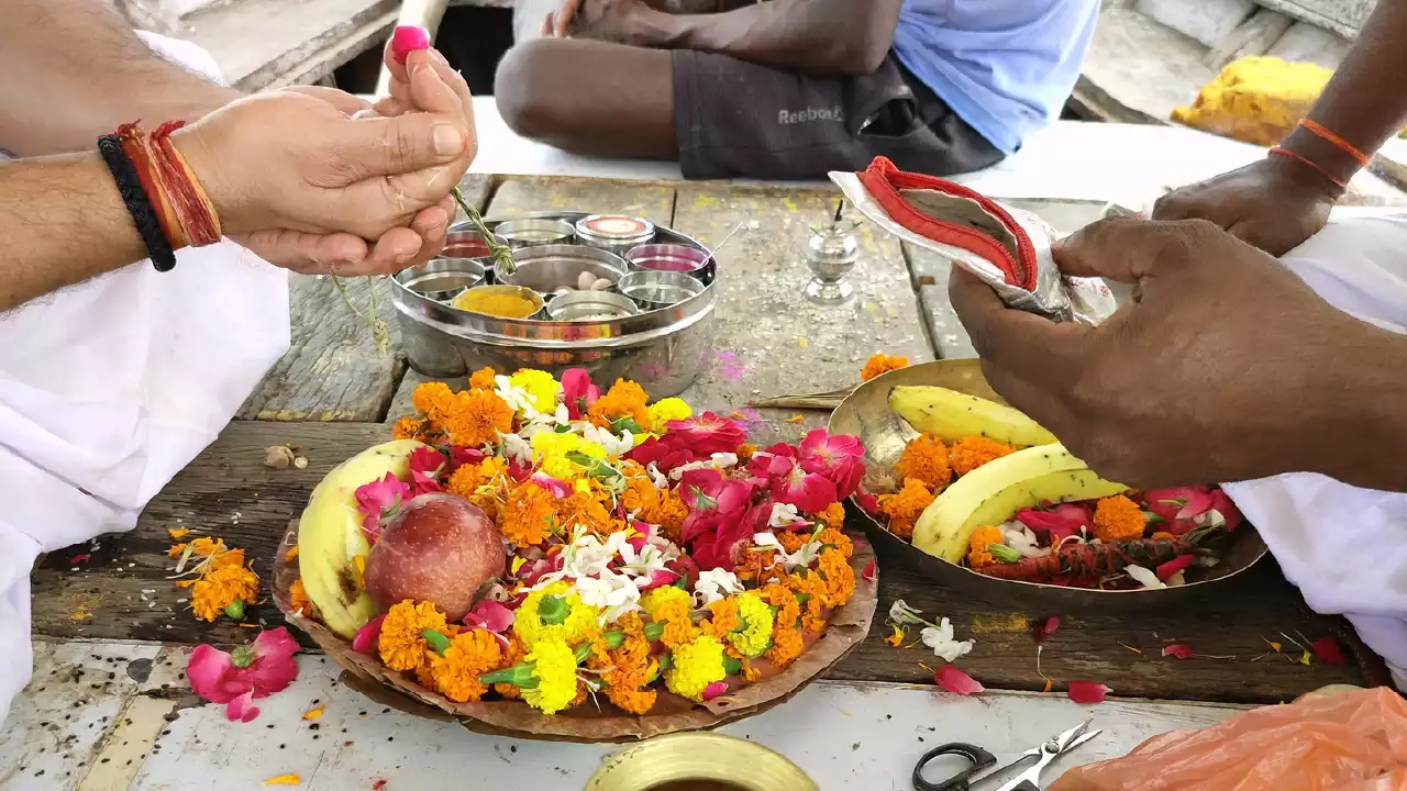 Image of a person doing some rituals for their ancestors 