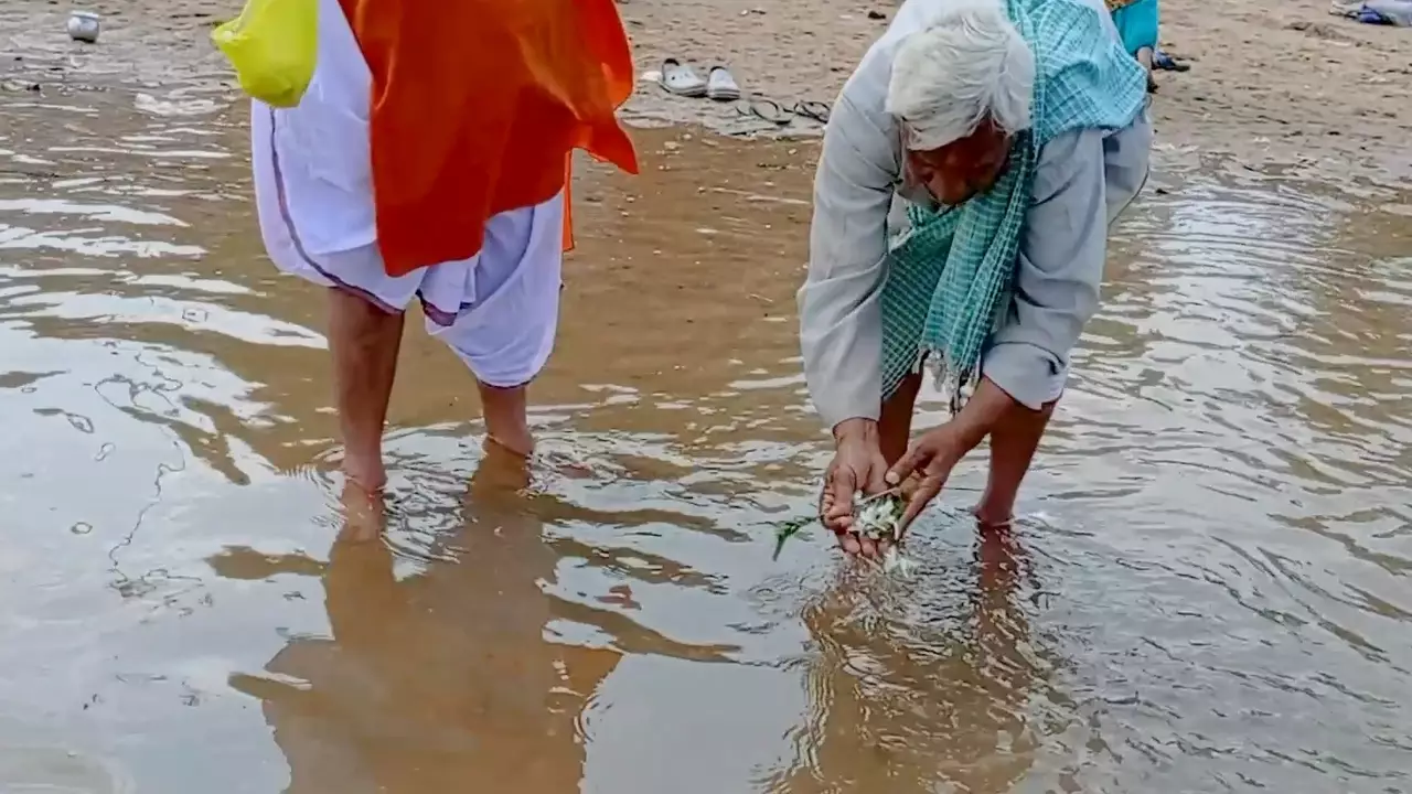 Photo of a person performing Tarpan-Ancestor Rituals Explained