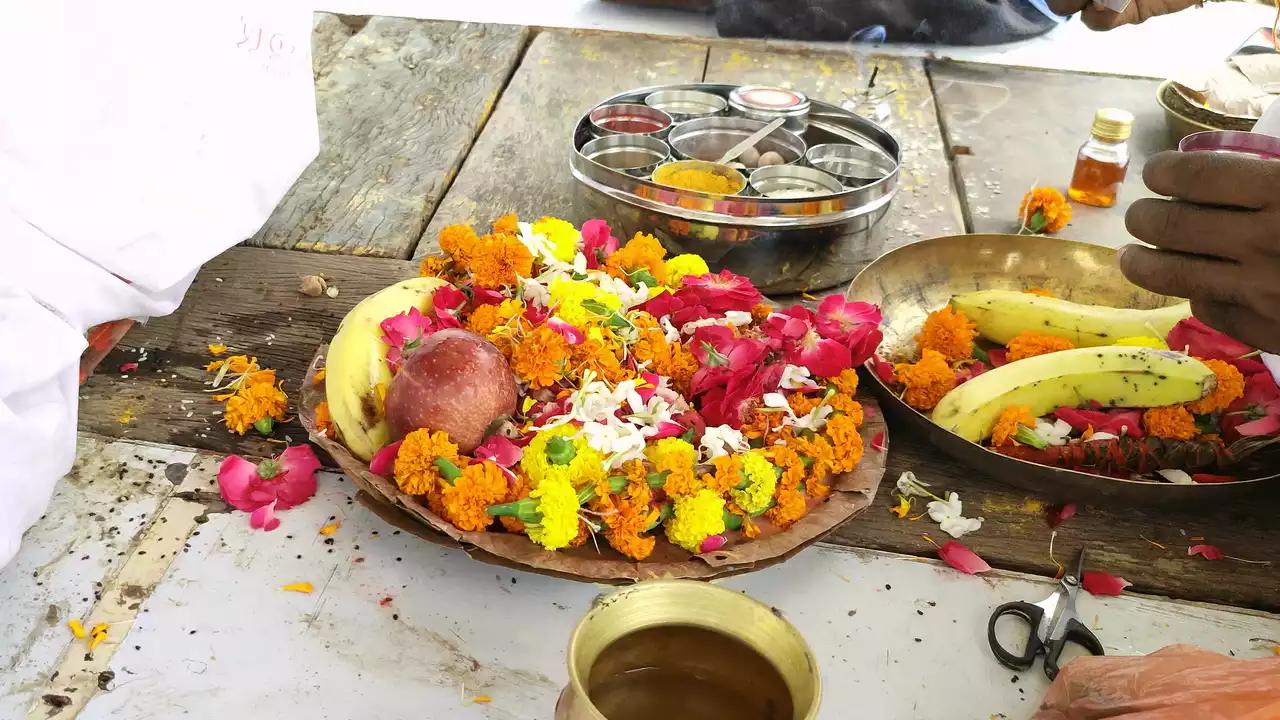 Offerings of fruits, Water, flowers, and ritual items prepared for Shraddha ceremony- Pitru Deva and Rishi Tarpan Differences